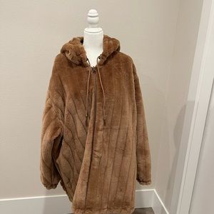 Size 4x. Brown color coat. Never worn before.